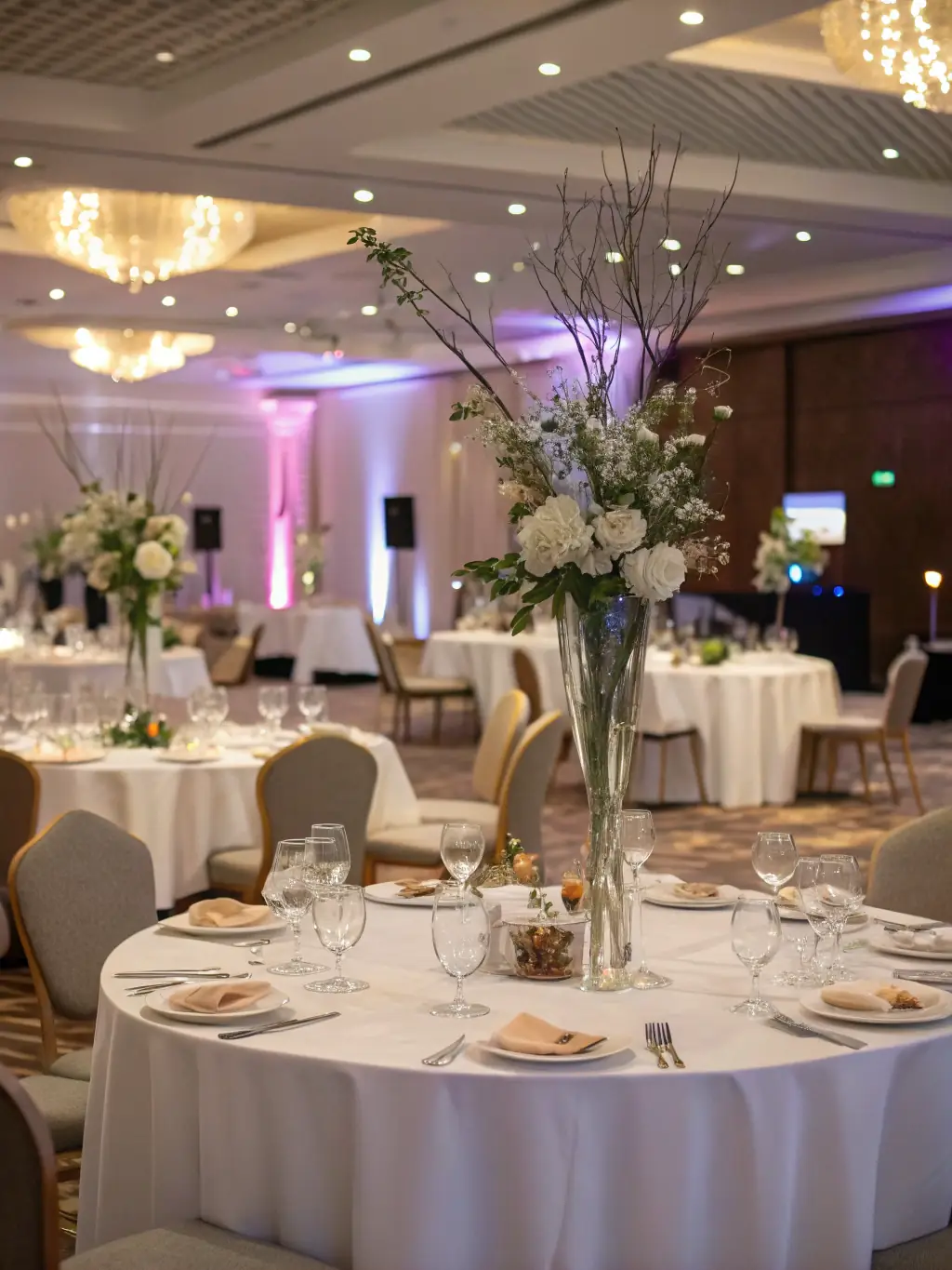 A vibrant image of a corporate event setup with branded decorations and professional lighting, showcasing Kylect's expertise in corporate event production.